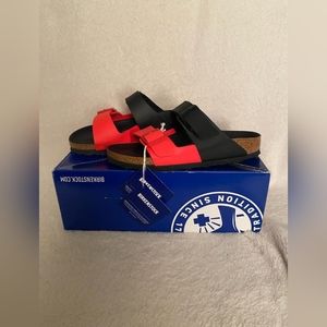 Black and red Birkenstocks